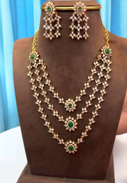 Beautiful 3 layered short necklace with diamond look and green stones